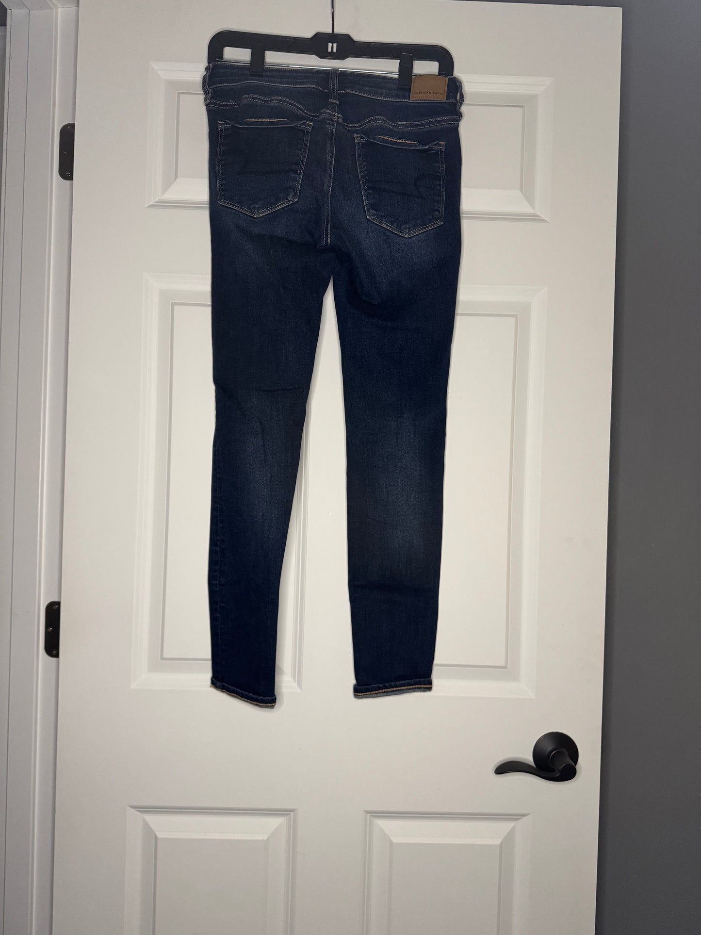 American Eagle next level stretch Jegging dark wash distressed regular 6
