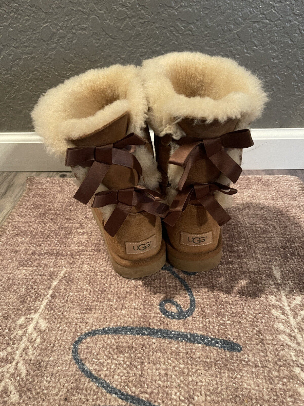 Ugg boots with bowties size 8 brown