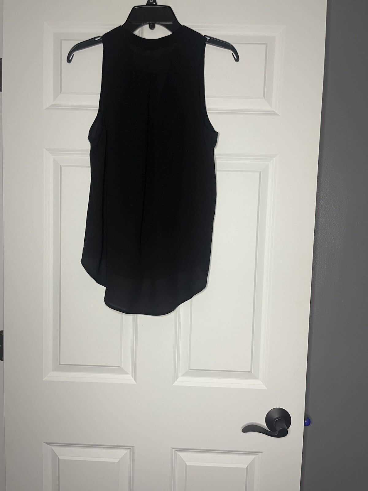 Lush sleeveless blouse small black