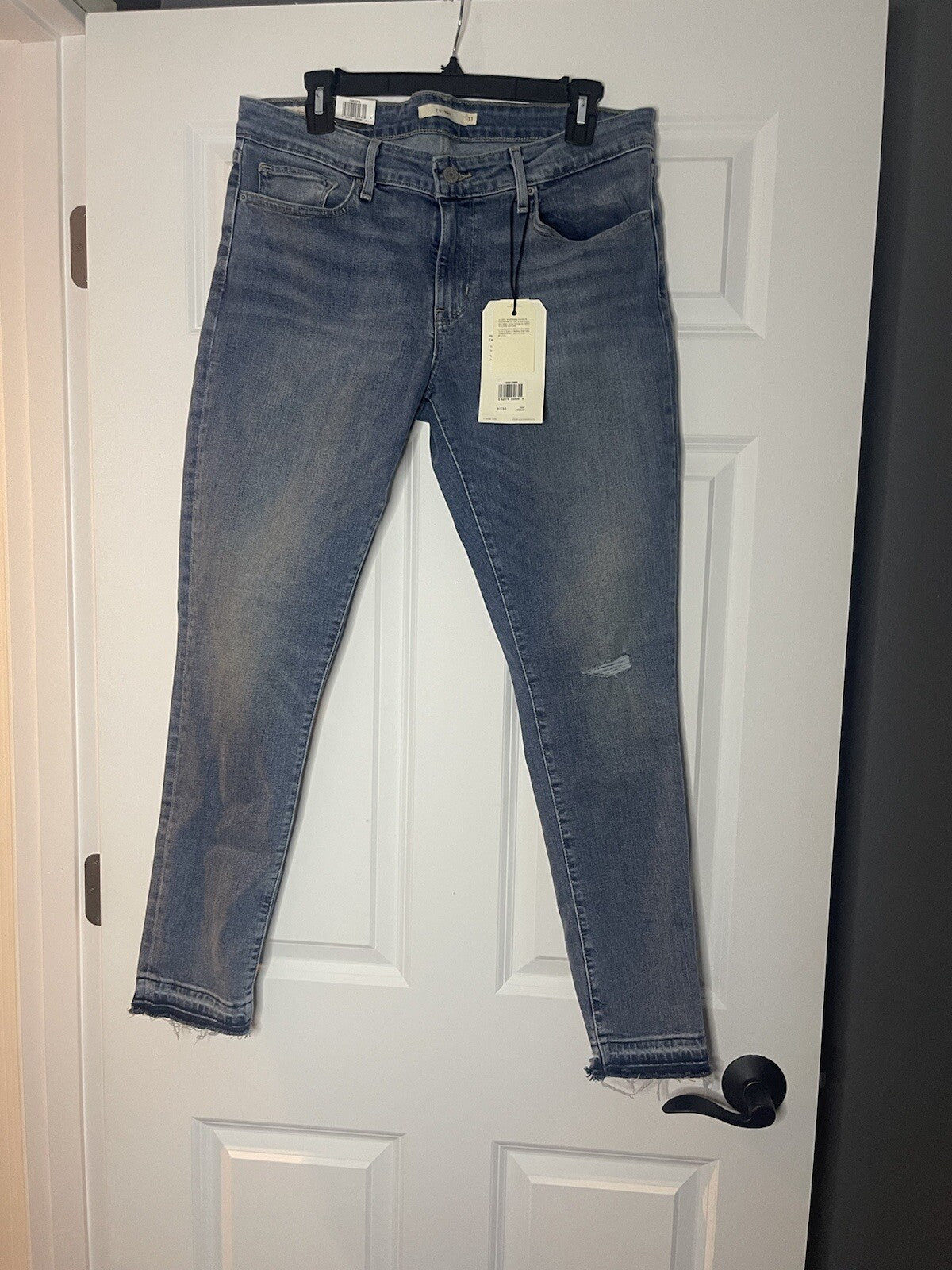 Levi 711 skinny jeans size 31x 32 womens NWT msrp 128.00