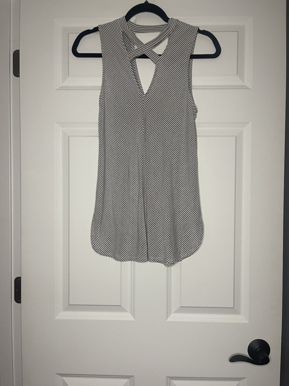 Soprano sleeveless blouse small black white stripe with cut outs 