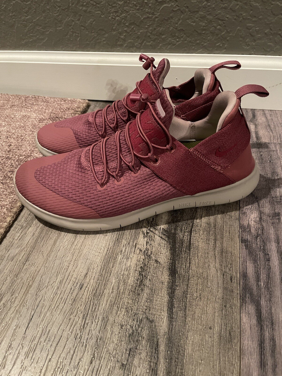 Nike running shoes size 10.5 fuscia and gray
