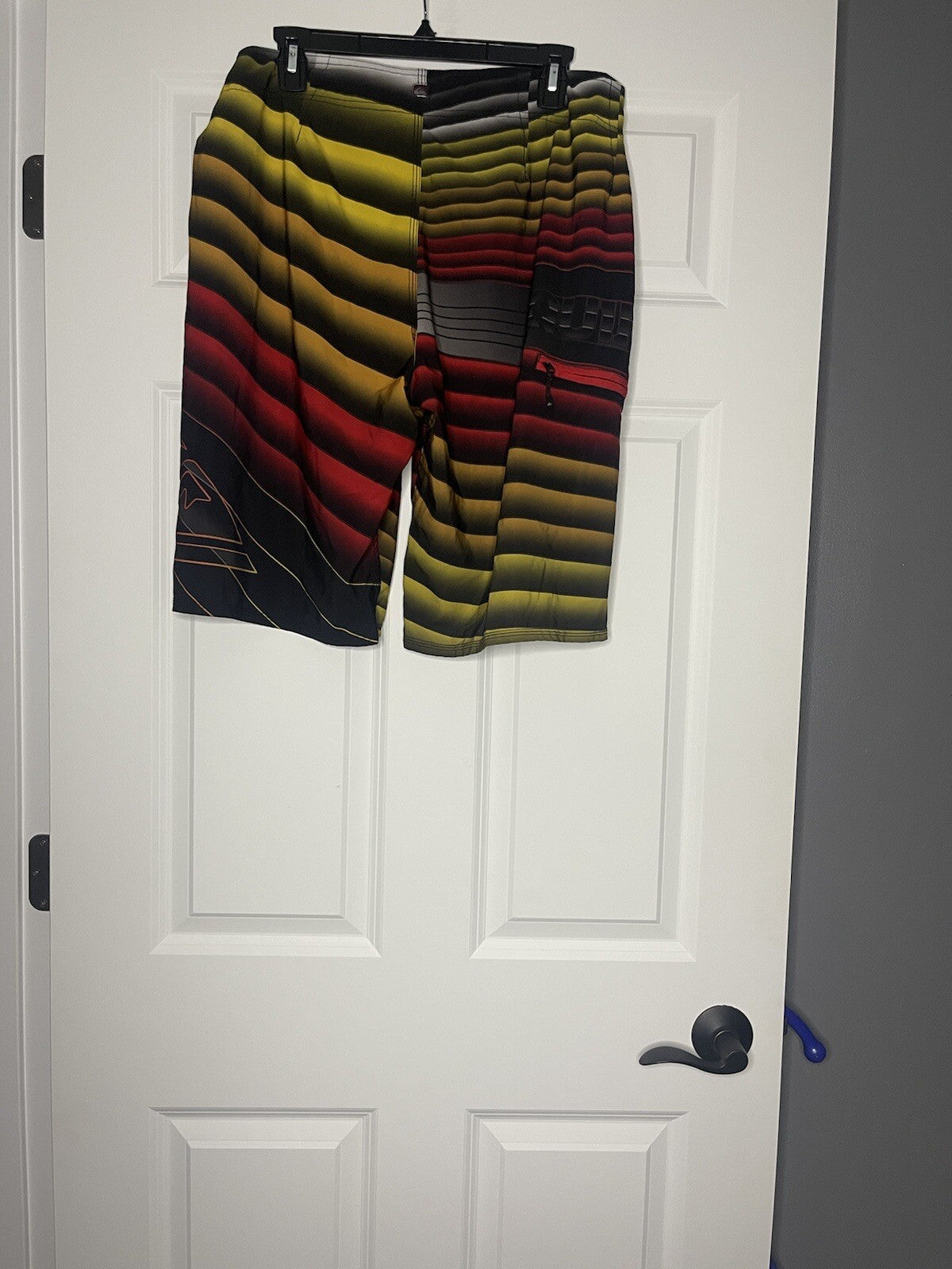 Quiksilver swim trunks size 34 red black yellow orange 