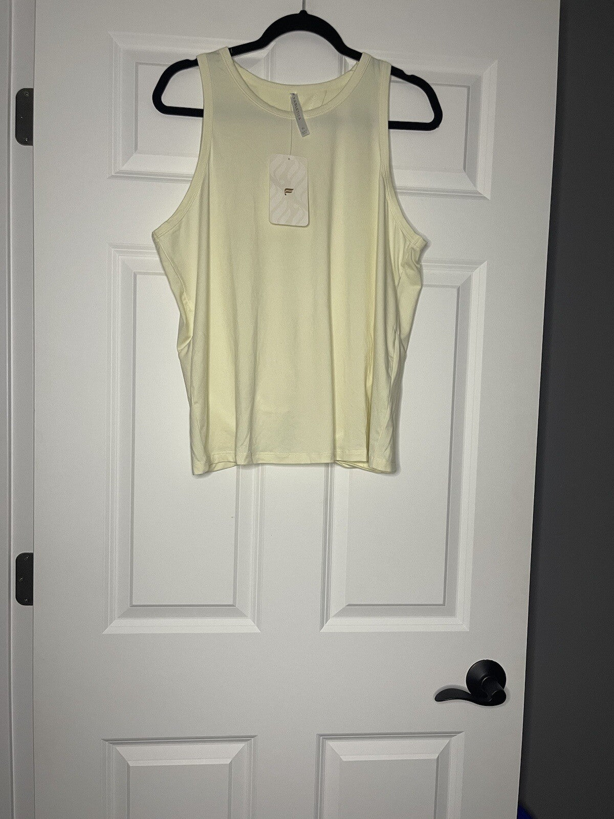 Fabletics blake open back twist tank xl light yellow NWT