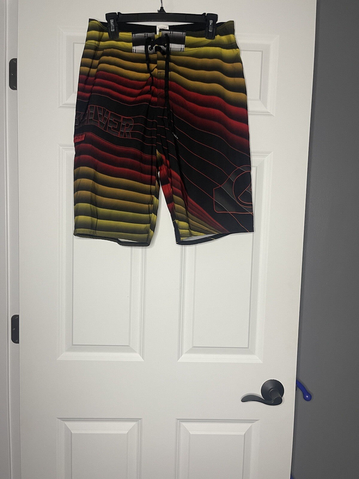Quiksilver swim trunks size 34 red black yellow orange 