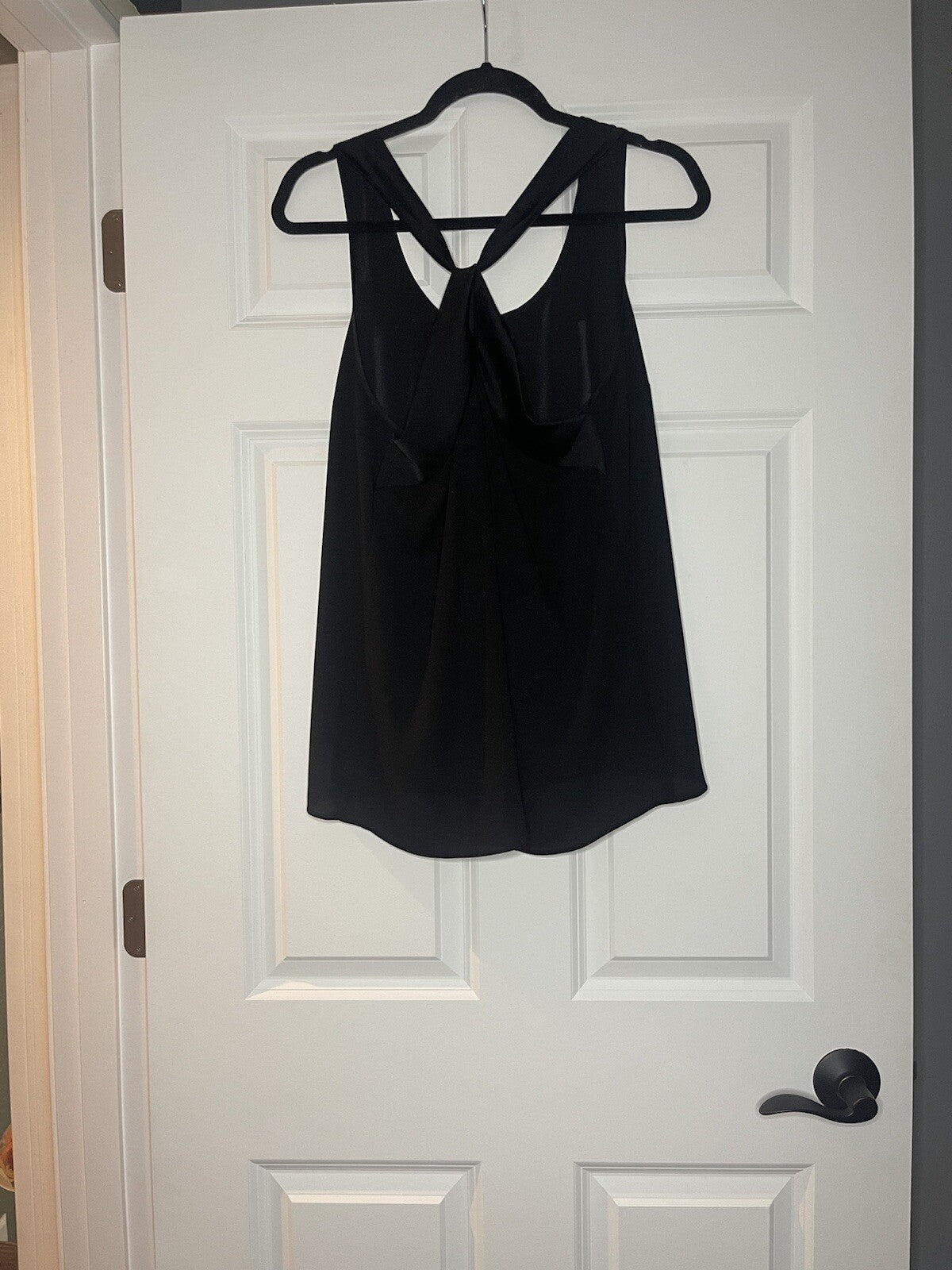 Express sleeveless blouse with twist back medium black NWT