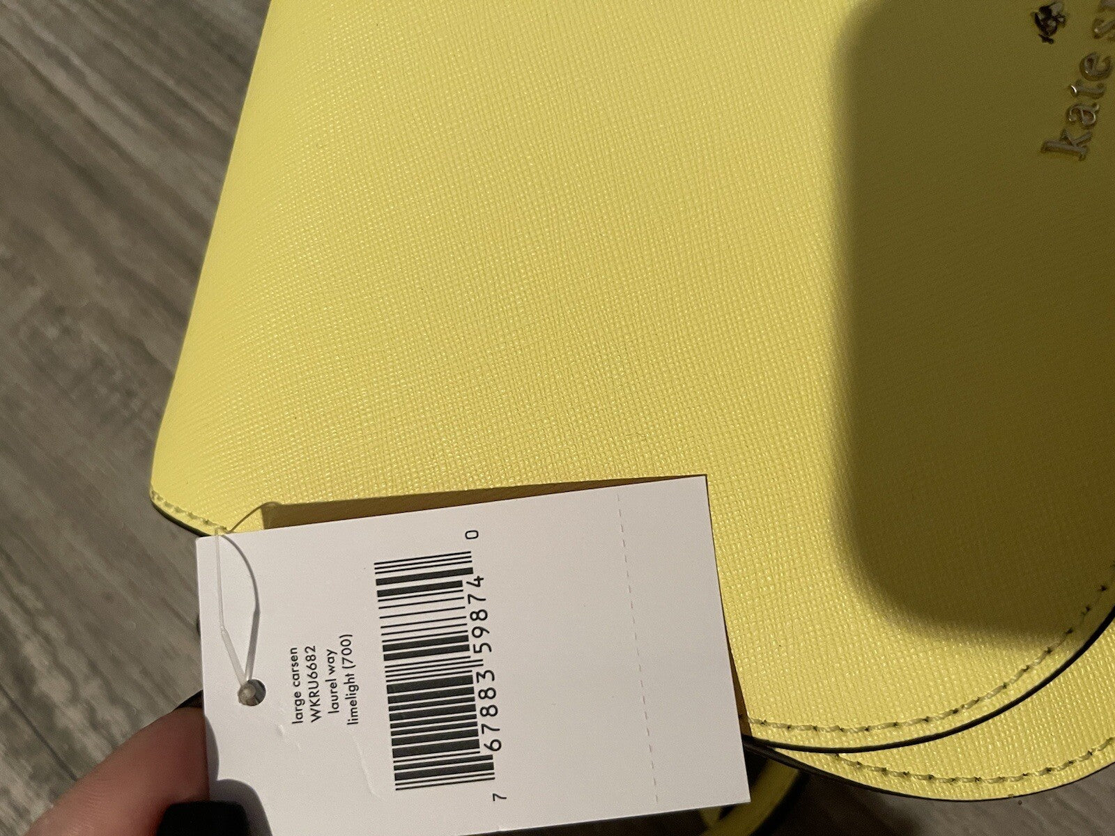 Kate Spade limelight purse NWT small mark as shown on back 