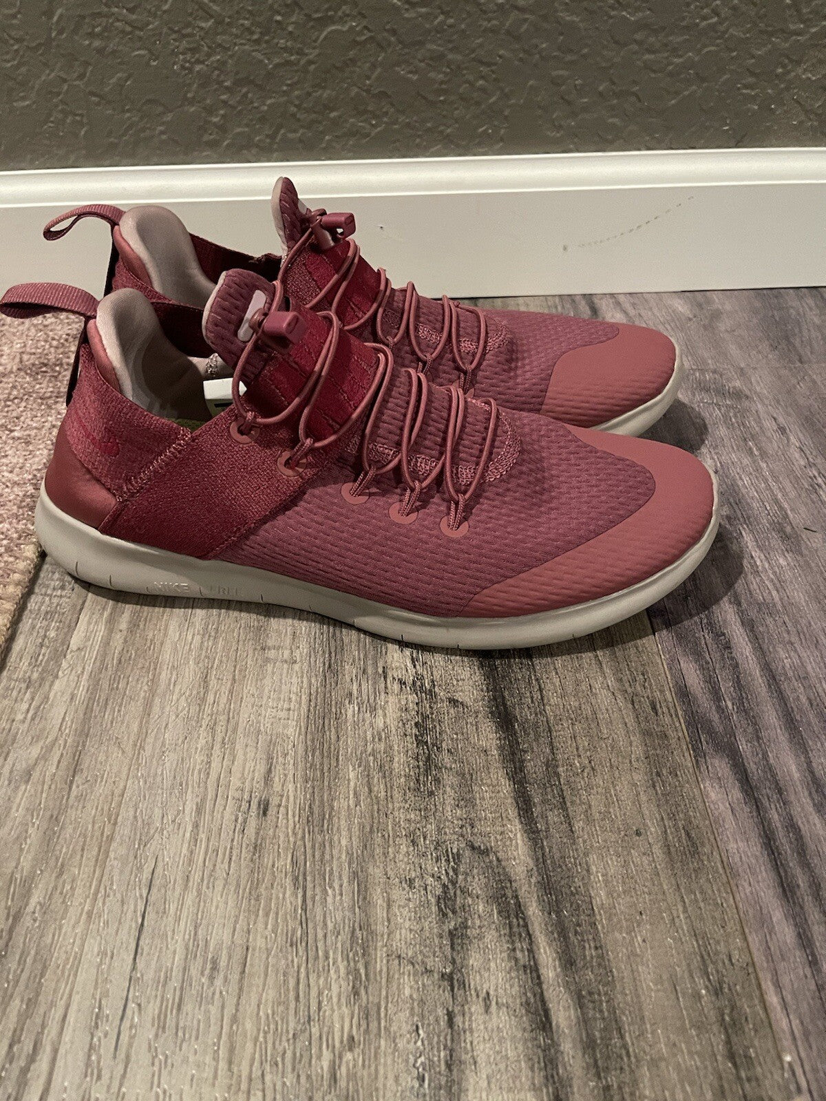 Nike running shoes size 10.5 fuscia and gray