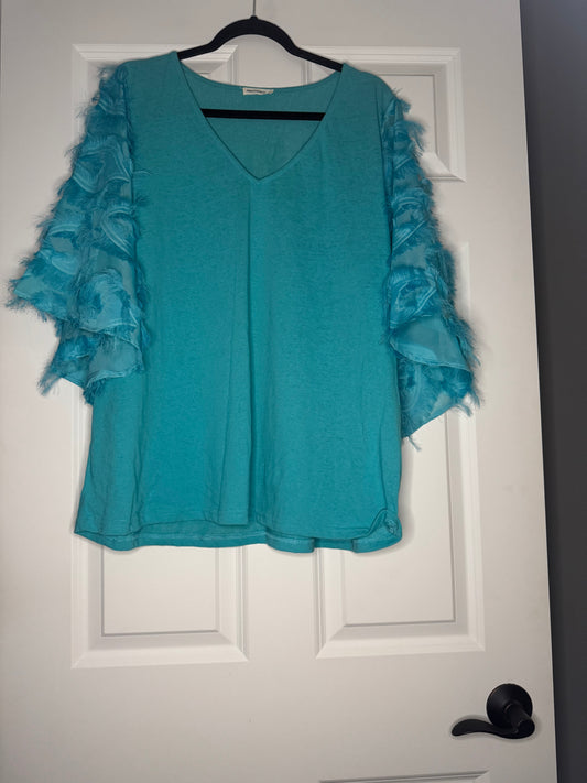 And the why half sleeve blouse green with feather sleeves 1x